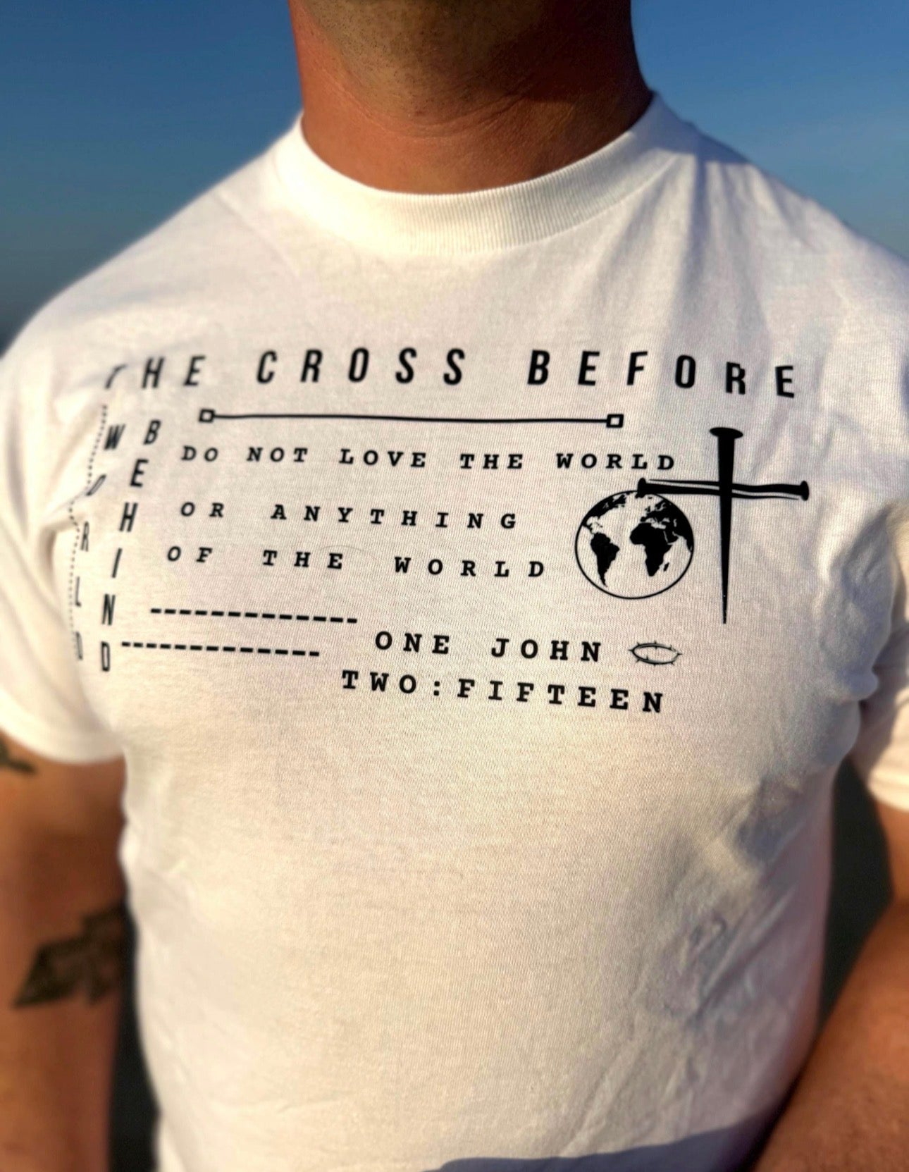 Christian Graphic Tee | The Cross Before the World Shirt | 1 John 2:15 Scripture Shirt | Faith Based Streetwear | Christian Men’s Tee |